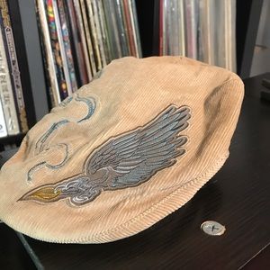 Goorin brothers flat cap. embroidered, quilted, corduroy hat with ear covers.